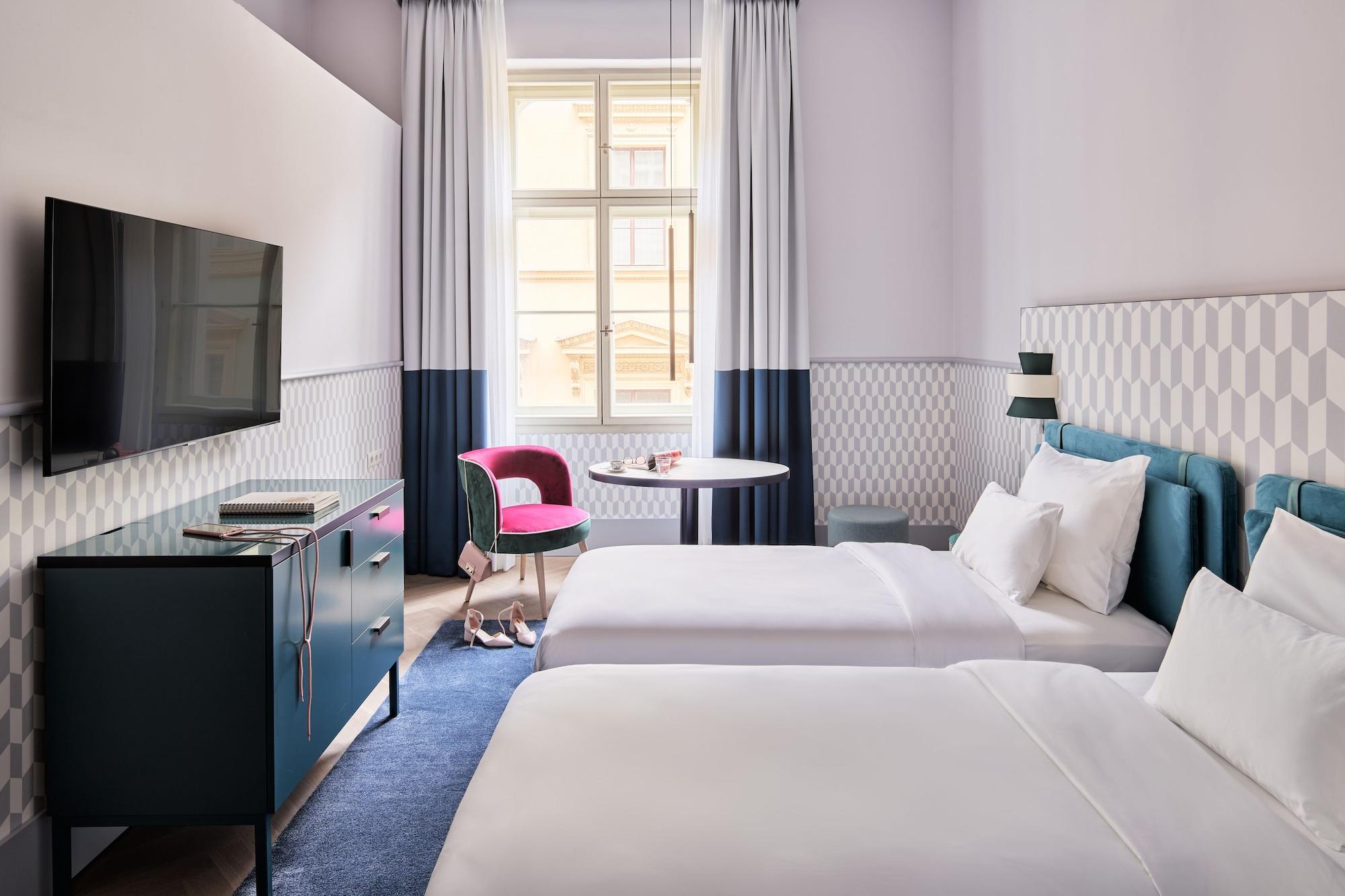 Falkensteiner Boutique Hotel Prága Kültér fotó A room at the Hotel Zags